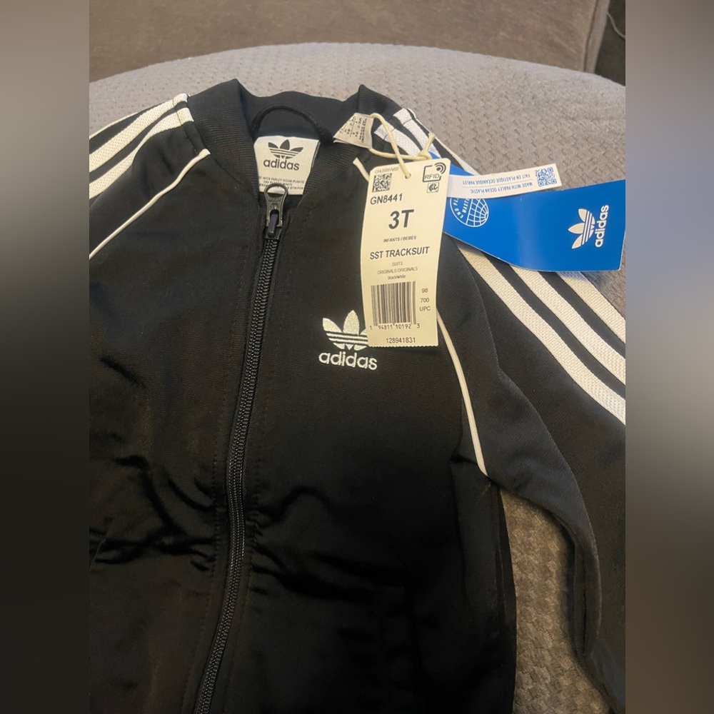 New w tags Adidas Track suit